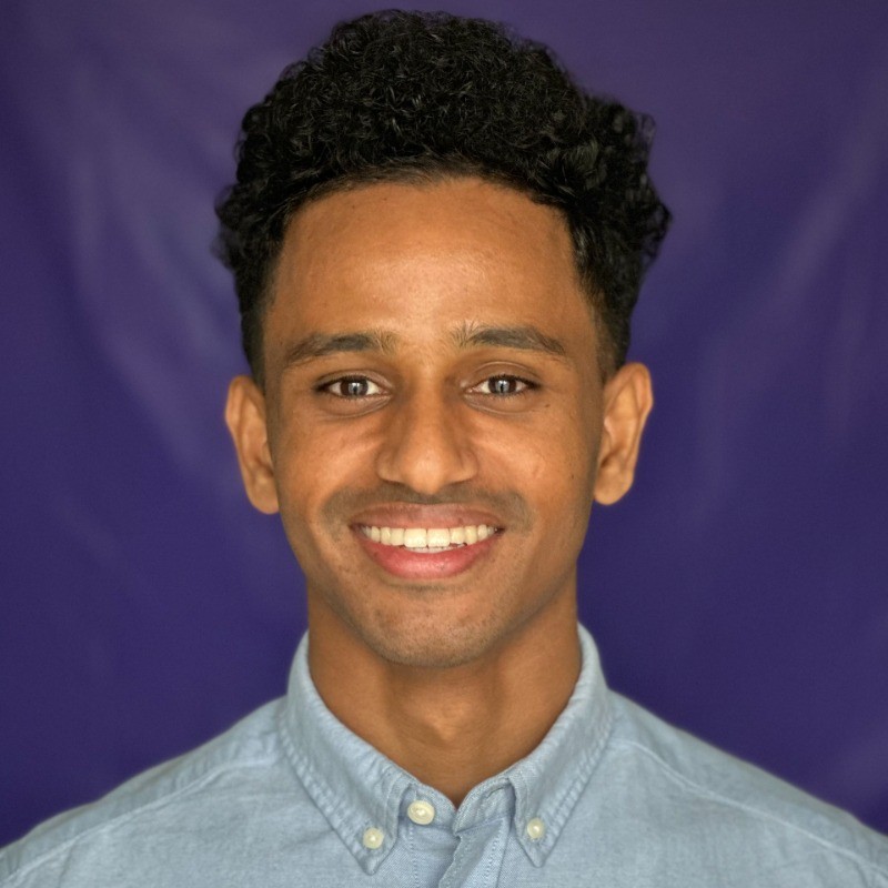 Hermon working with a client